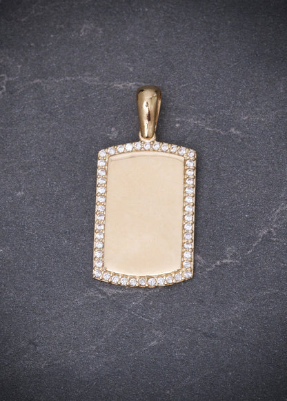 Dije placa con swarovski blanco 2.6gr / Largo 2.6cm / Oro Amarillo Nac P