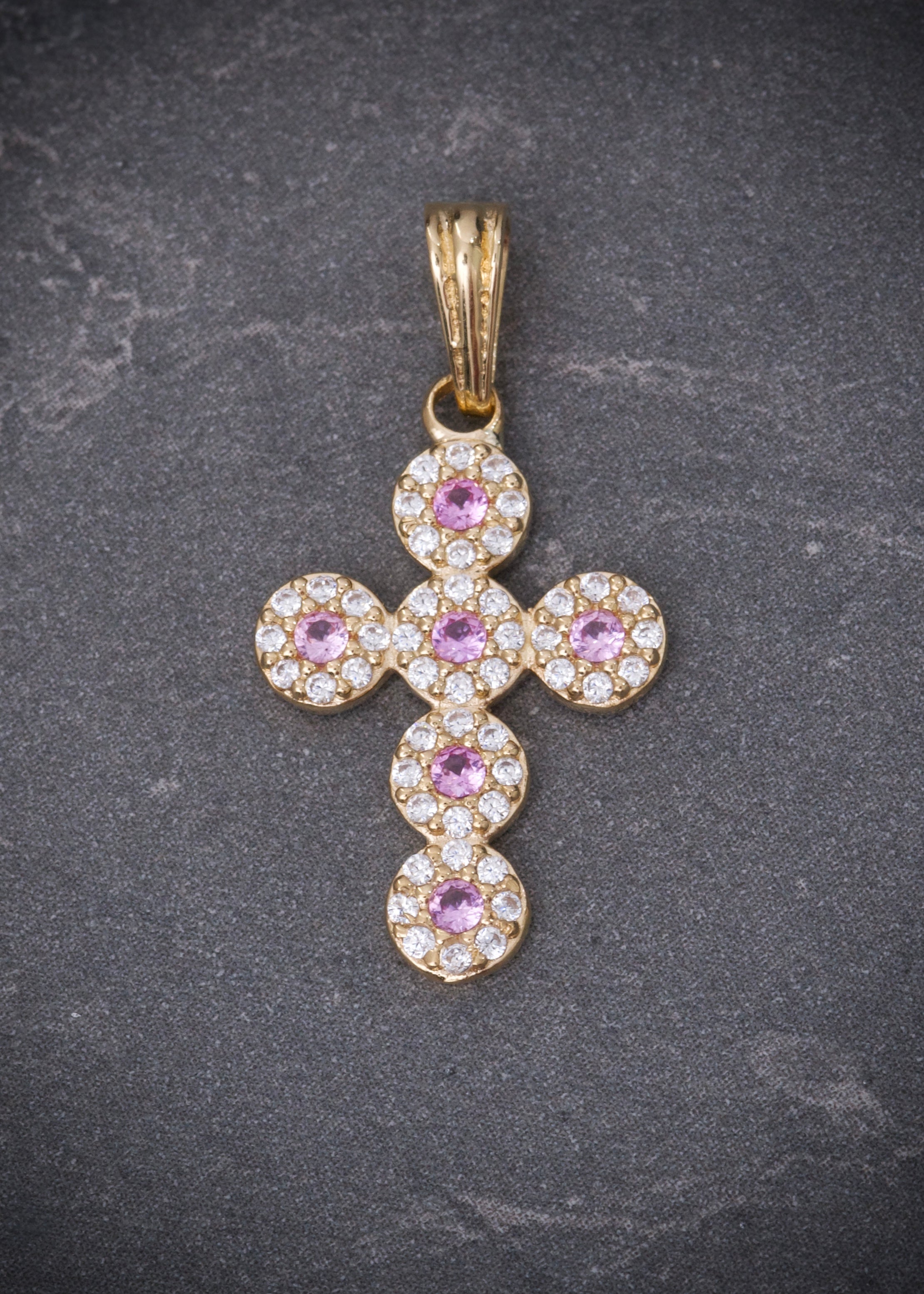 Dije cruz con swarovski rosado y blanco 1.65gr / Largo 2.5cm / Oro Amarillo Nac B