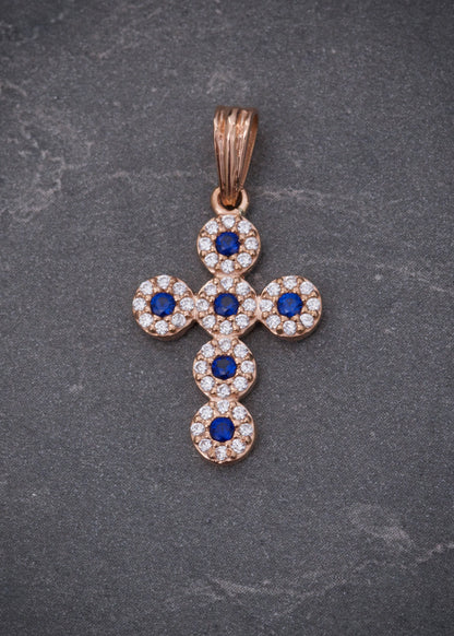 Dije cruz con swarovski azul y blanco 1.6gr / Largo 2.5cm / Oro Rosado Nac M