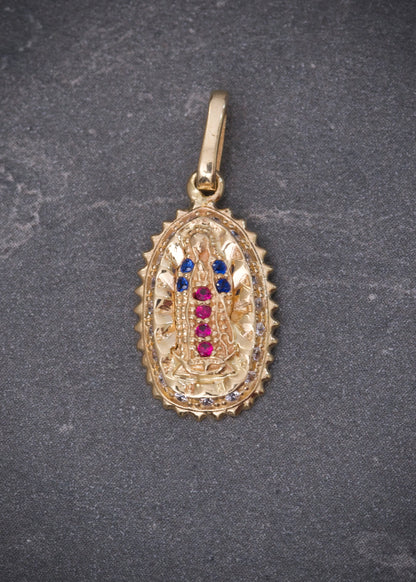 Dije virgen de guadalupe con swarovski azul 1.4gr / Largo 2.3cm / Oro Amarillo Nac P