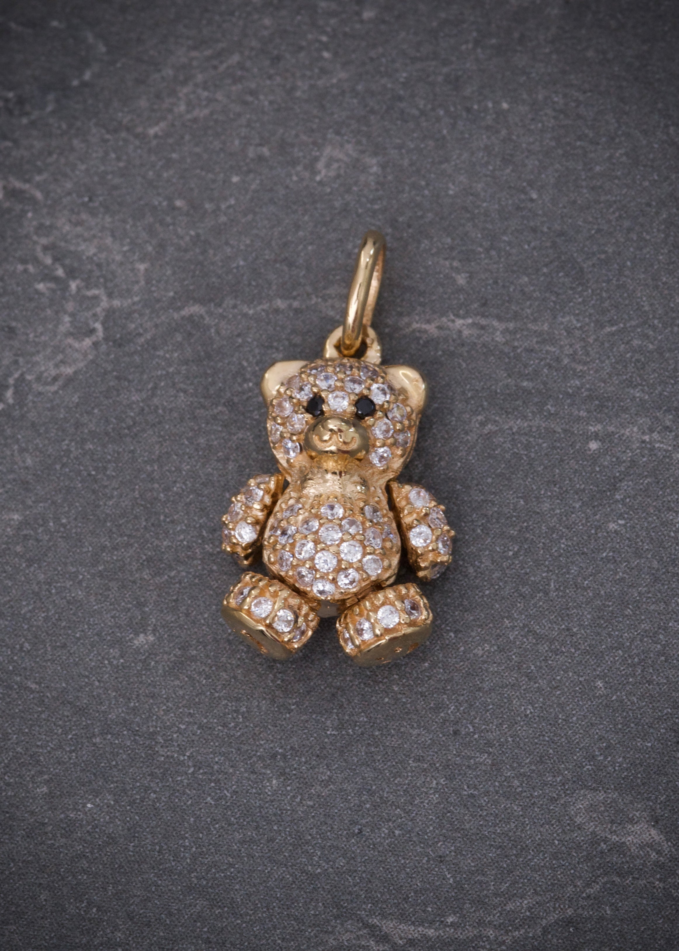 Dije oso articulado con swarovski blanco 2.65gr / Largo 2cm / Oro Amarillo Nac P