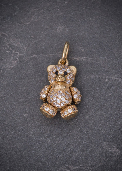 Dije oso articulado con swarovski blanco 2.65gr / Largo 2cm / Oro Amarillo Nac P