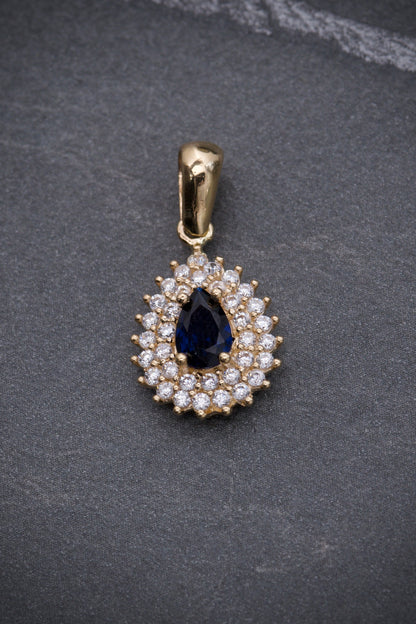 Dije lagrima con swarovski azul oscuro y blanco 1.8gr / Largo 2cm / Oro Amarillo Nac P