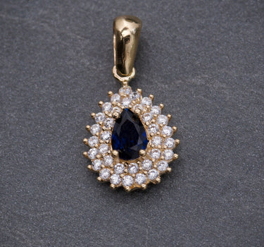 Dije lagrima con swarovski azul oscuro y blanco 1.8gr / Largo 2cm / Oro Amarillo Nac P