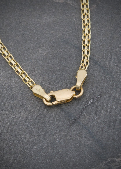 Cadena China 3.95gr / 70cm / 2.2mm — Oro Amarillo