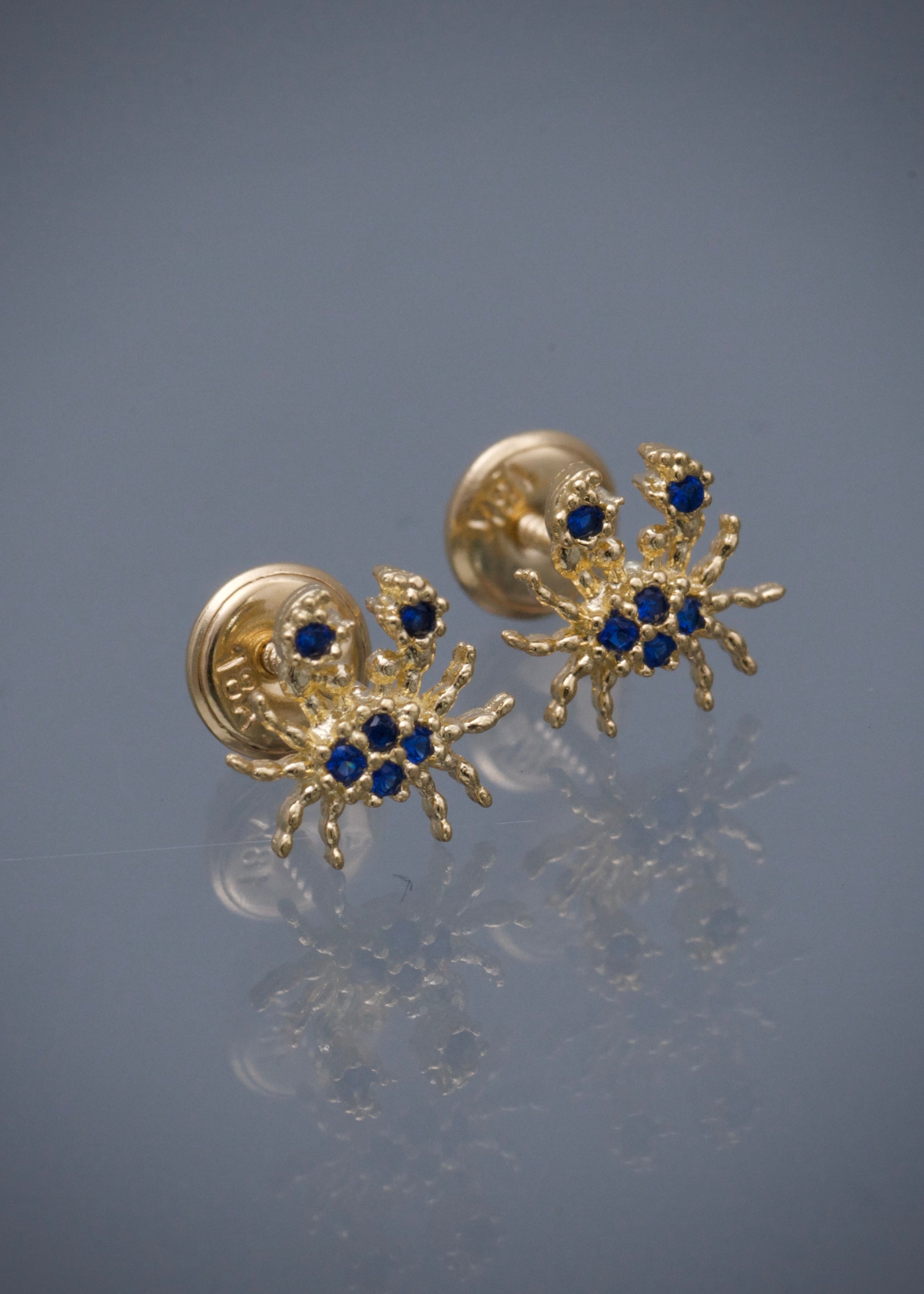 Topos cangrejo con swarovski azul 1gr / Largo 0,8 cm / Oro Amarillo Nac M
