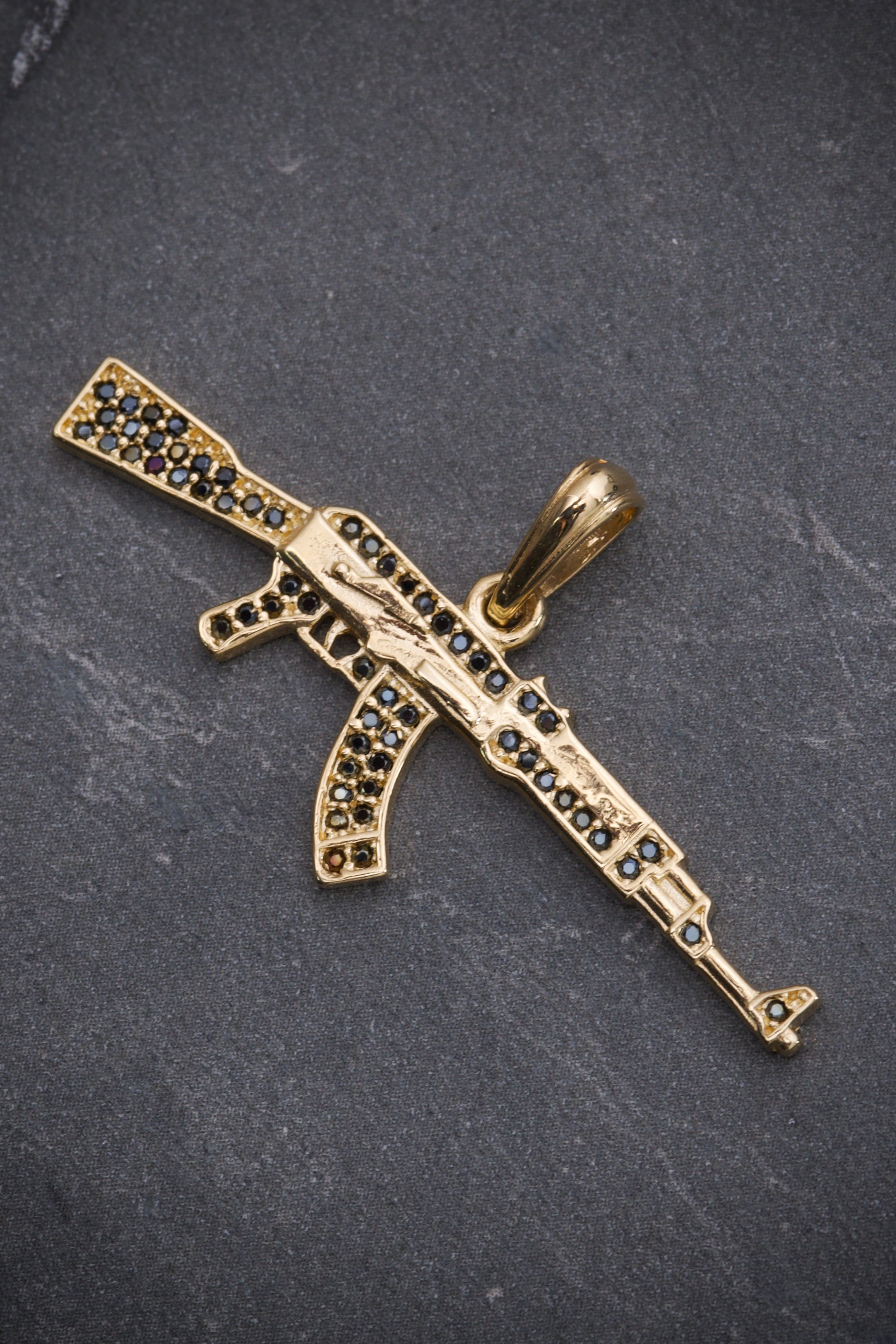 Dije DE FUsil COn Swarovski NEgro 3.4gr / Largo 2.0cm / Oro Amarillo Nac B