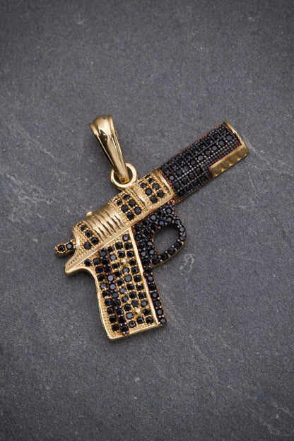 Dije DE PIStola CON Swarovski NEgro 4.8gr / Largo 3.1cm / Oro Amarillo Nac B
