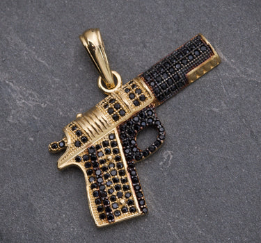 Dije DE PIStola CON Swarovski NEgro 4.8gr / Largo 3.1cm / Oro Amarillo Nac B