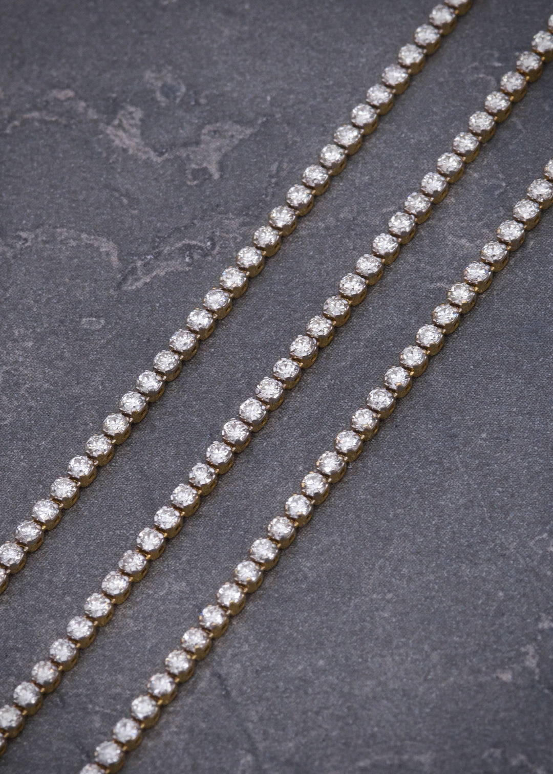Pulso tenis con 131pts de diamante blanco 2.1gr / Largo 17.5cm — Oro Amarillo