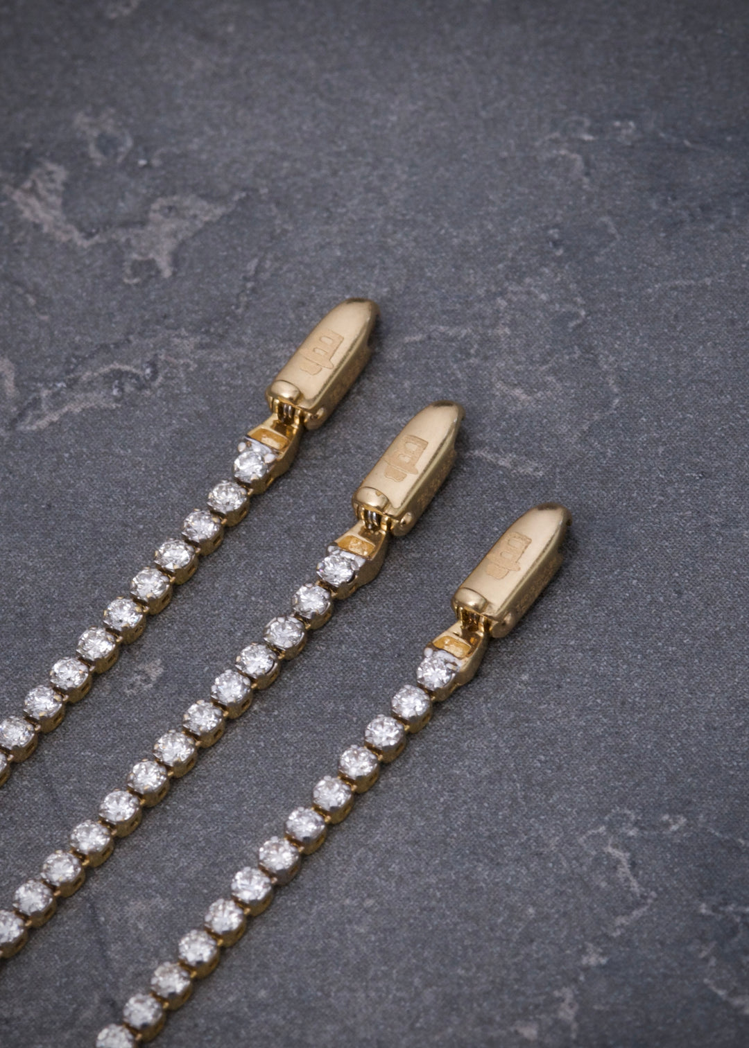 Pulso tenis con 131pts de diamante blanco 2.1gr / Largo 17.5cm — Oro Amarillo