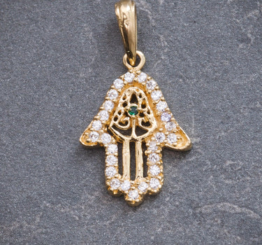 Dije mano hamsa con swarovski blanco y verde 1.55gr / Largo 2.5cm / Oro Amarillo Nac M