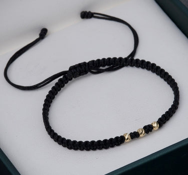 Pulsera en Hilo Negro con bolas diamantadas 3mm 0.15gr / Oro Amarillo (Joya) M
