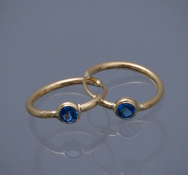 Candongas con swarovski azul 0.6gr / Largo 1.1cm / Oro Amarillo Nac P
