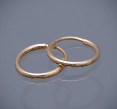 Candongas lisas 0.5gr / Largo 1cm / Oro Amarillo Nac B