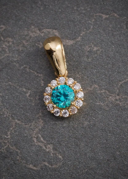 Dije flor con swarovski azul y blanco 0.9gr / Largo 1.4cm / Oro Amarillo Nac B