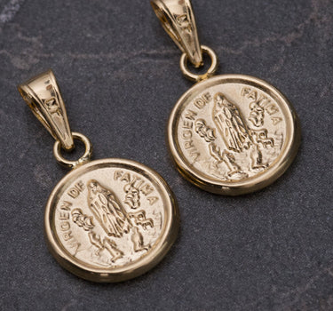 Dije nuestra señora fatima 0.55gr / Largo 1.8cm / Oro Amarillo Nac B