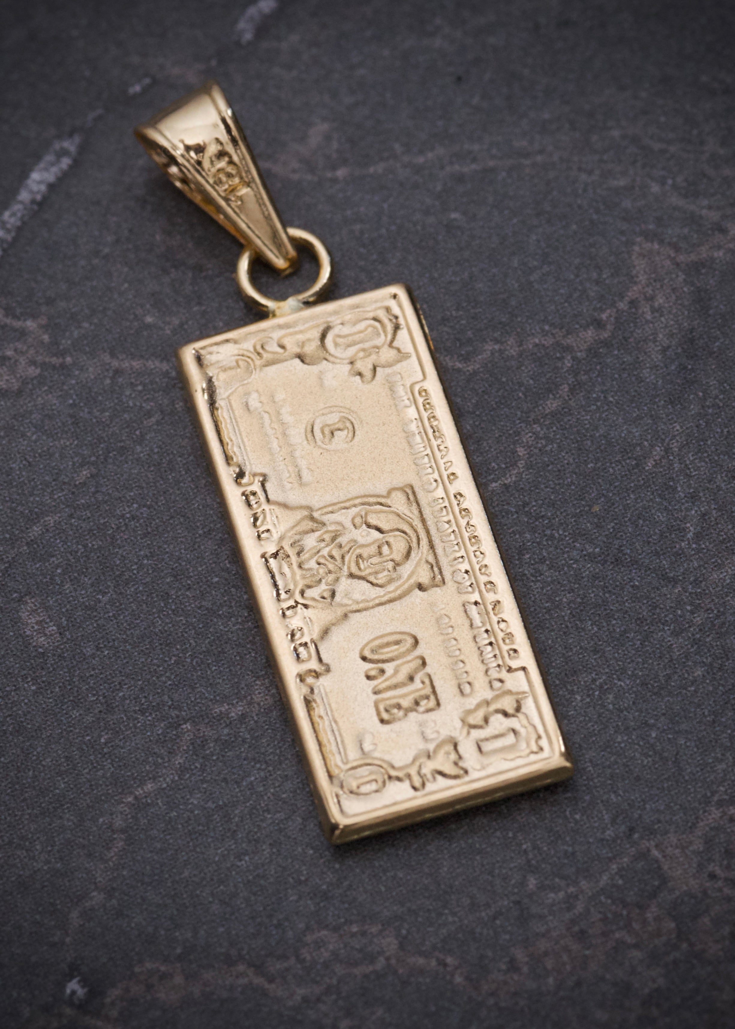 Dije dolar 1.4gr / Largo 2.9cm / Oro Amarillo Nac M