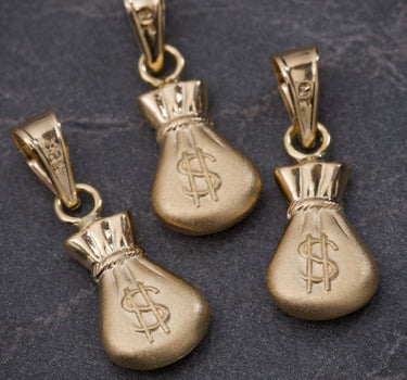Dije bolsa de dinero 0.4gr / Largo 1.8cm / Oro Amarillo Nac P