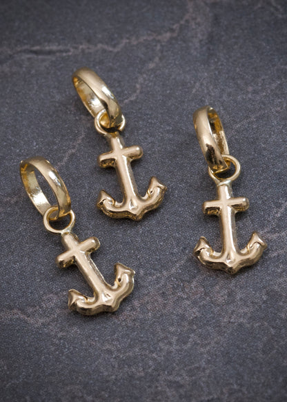 Dije ancla 0.25gr / Largo 1.4cm — Oro Amarillo