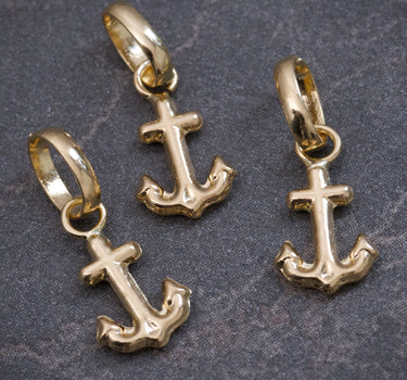 Dije ancla 0.25gr / Largo 1.4cm / Oro Amarillo Nac M