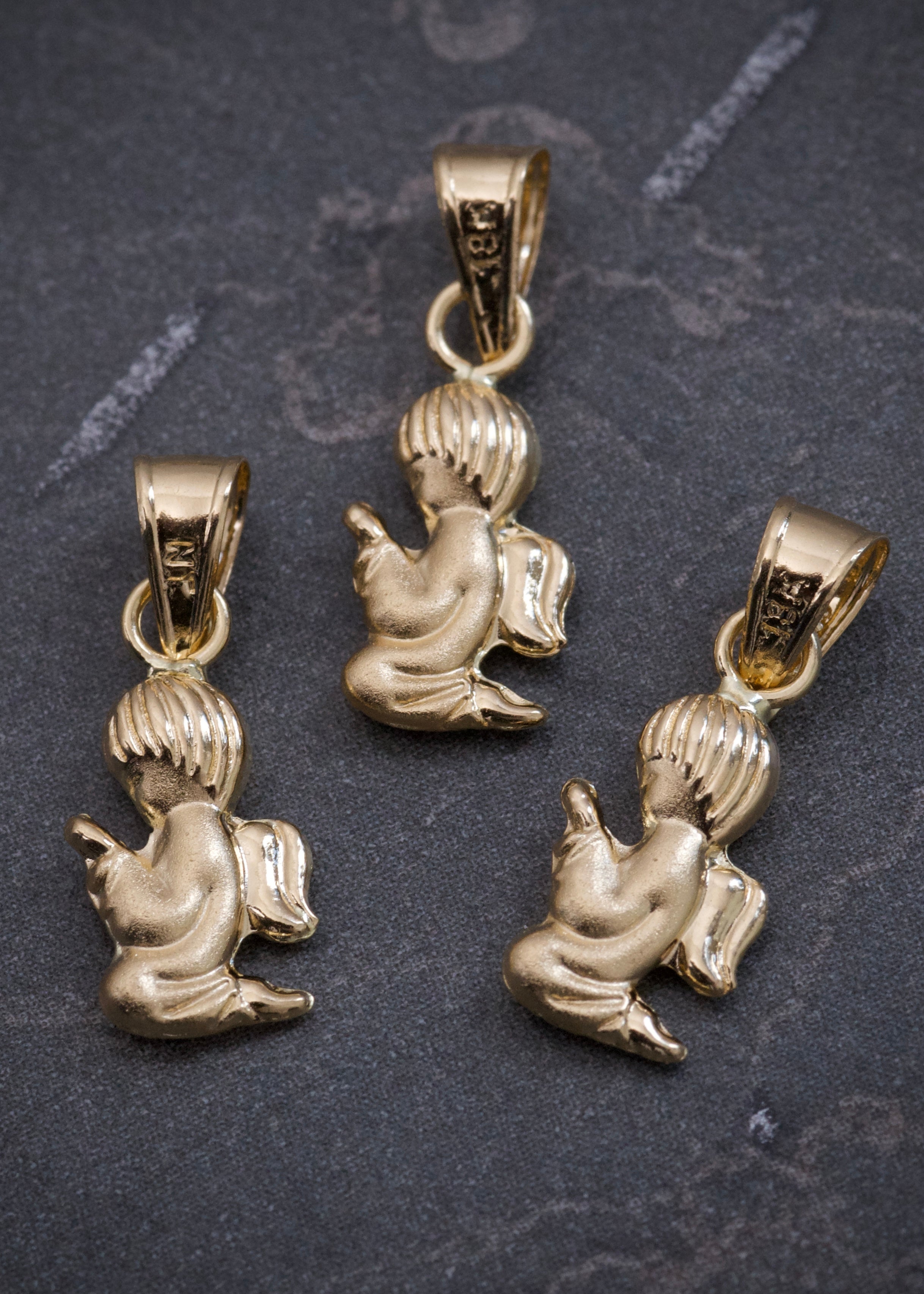 Dije angel de la guarda 0.3gr / Largo 1.7cm / Oro Amarillo Nac P