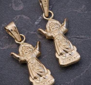 Dije divino niño 0.55gr / Largo 2.2cm / Oro Amarillo Nac M