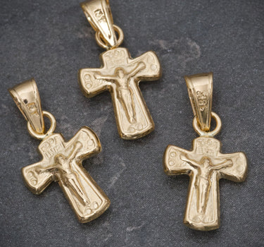Dije Cruz con cristo 0.35gr / Largo 1.7cm / Oro Amarillo Nac P
