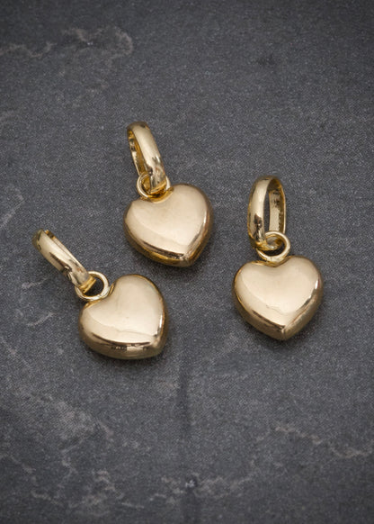 Dije  corazon liso 0.3gr /Largo 1.3cm / Oro Amarillo Nac B