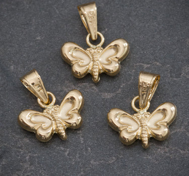 Dije mariposa 0.4gr / Largo 1.3cm / Oro Amarillo Nac M