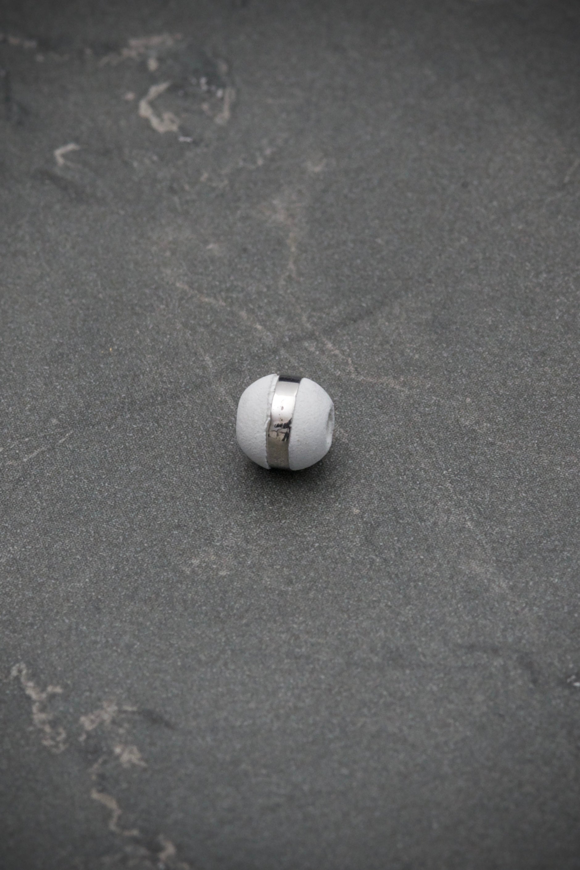 Neoro blanco 6mm 1 raya 0.06gr / Oro Blanco Nac B