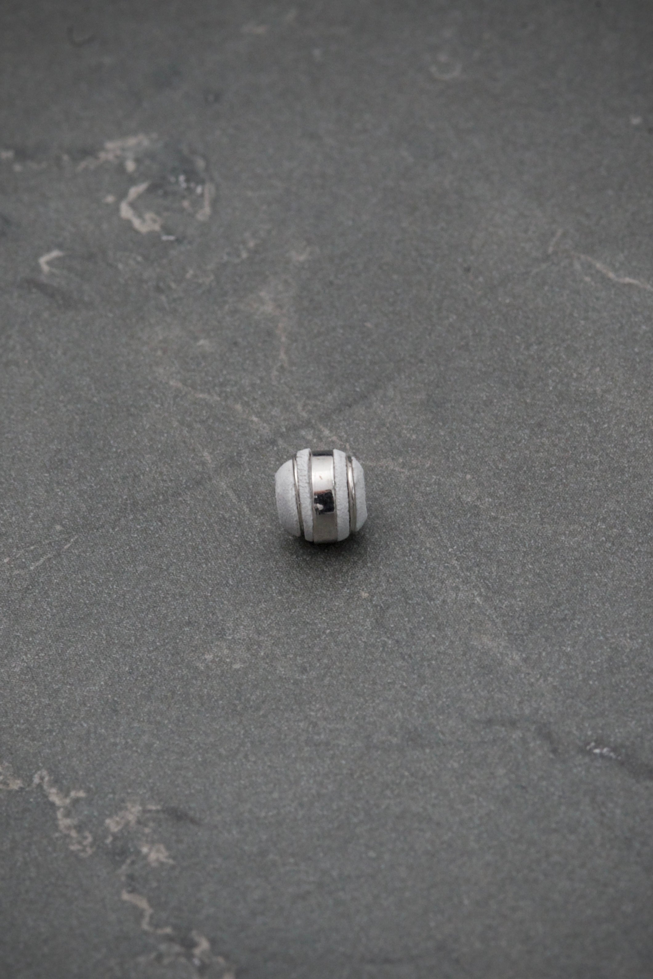Neoro blanco 6mm 3 rayas 0.14gr / Oro Blanco Nac B
