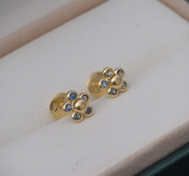 Topos de flor con swarovski azul cielo 0.8gr / Largo 1 cm / Oro Amarillo Nac *