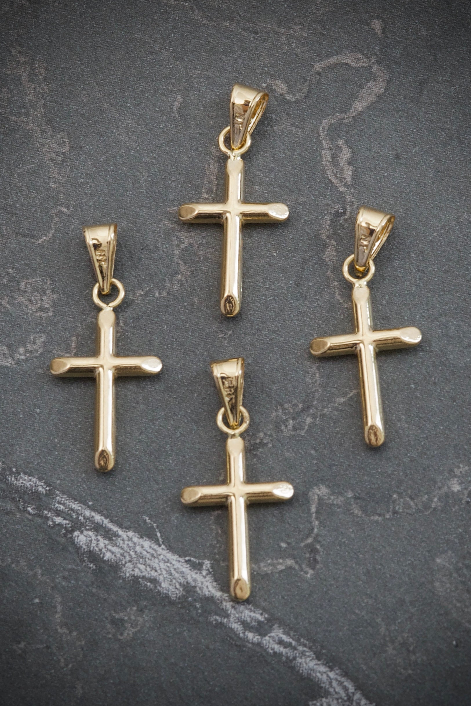 Dije cruz 0.4gr / 2.2cm / 10mm — Oro Amarillo