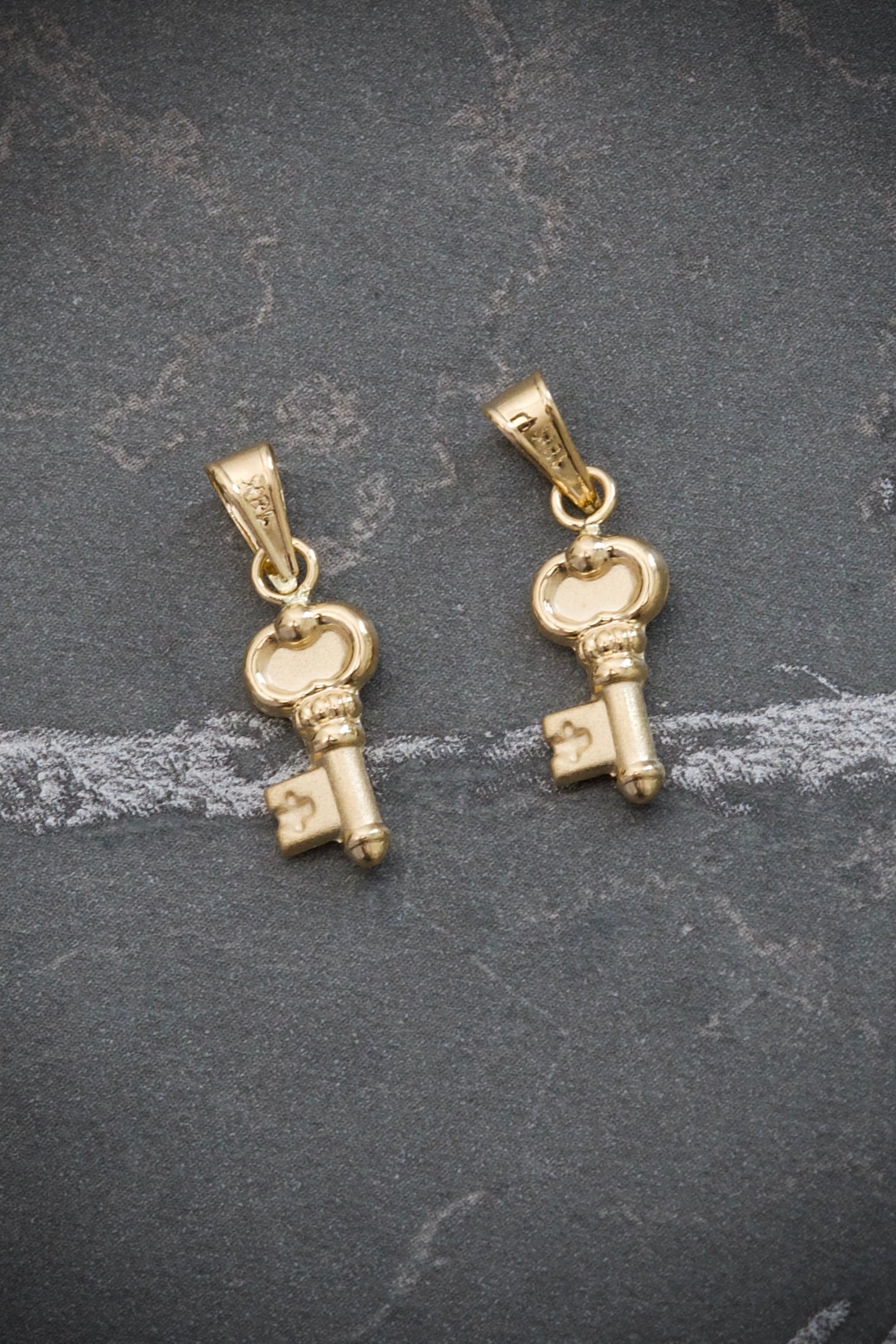 Dije de llave 0.45gr / Largo 1.5cm / Oro Amarillo Nac P