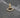 Dije ojo turco piedra central swarovski negro 0.6gr / 1.3cm / Oro Amarillo Nac B