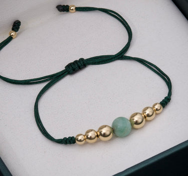 Pulsera en hilo verde con 255pts de morralla con bola lisas 0.9gr / Oro Amarillo (Joya) M