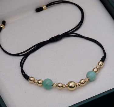 Pulsera en hilo negro  con 355pts de morralla  1.1gr / Oro Amarillo (Joya) M