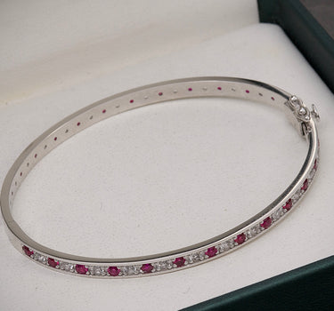 Pulso ARO CON 200PTS DE MOISSANITA FUCSIA Y BLANCA 16.4 gr / Largo 17.5cm / Oro Blanco Nac (Joya) B