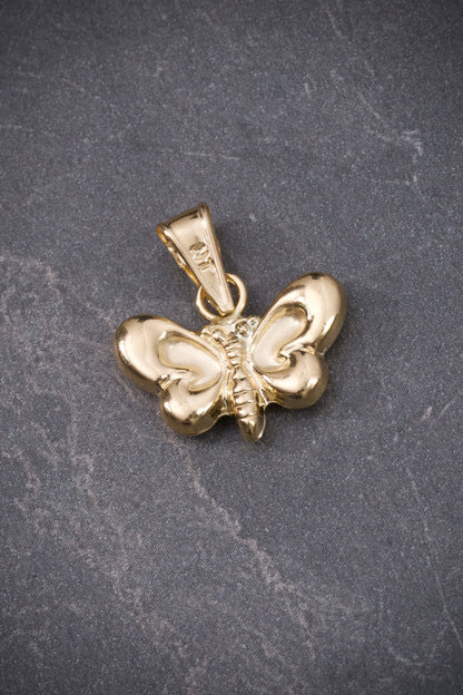 Dije de mariposa 0.75gr / Largo 1.7cm / Oro Amarillo Nac P