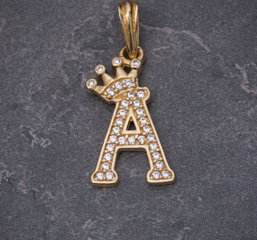 Dije letra A con swarovski blanco 1.4gr / Largo 2.4cm / Oro Amarillo Nac P