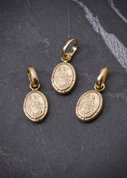 Dije virgen de la milagrosa 0.3gr / Largo 1.4cm / Oro Amarillo Nac M