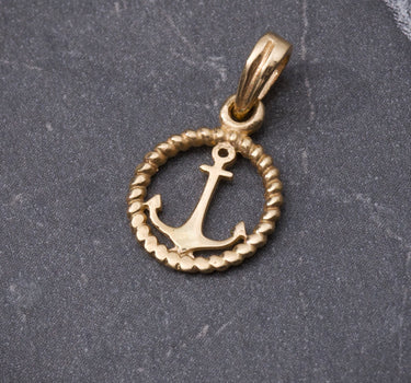 Dije ancla 0.6gr / Largo 1.7cm / Oro Amarillo Nac B