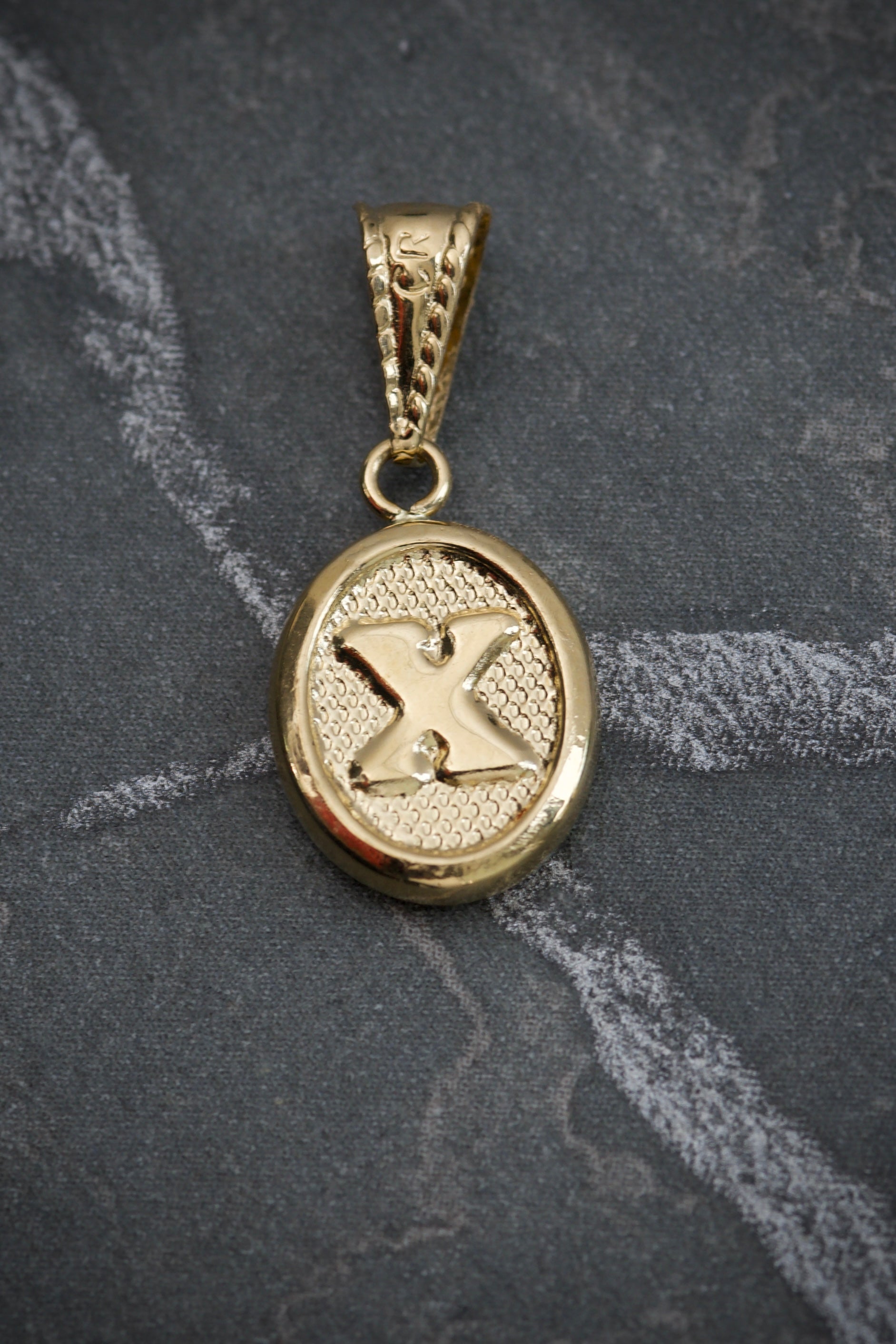 Dije De Letra X 0.5gr / Largo 2.0cm / Oro Amarillo Nac B