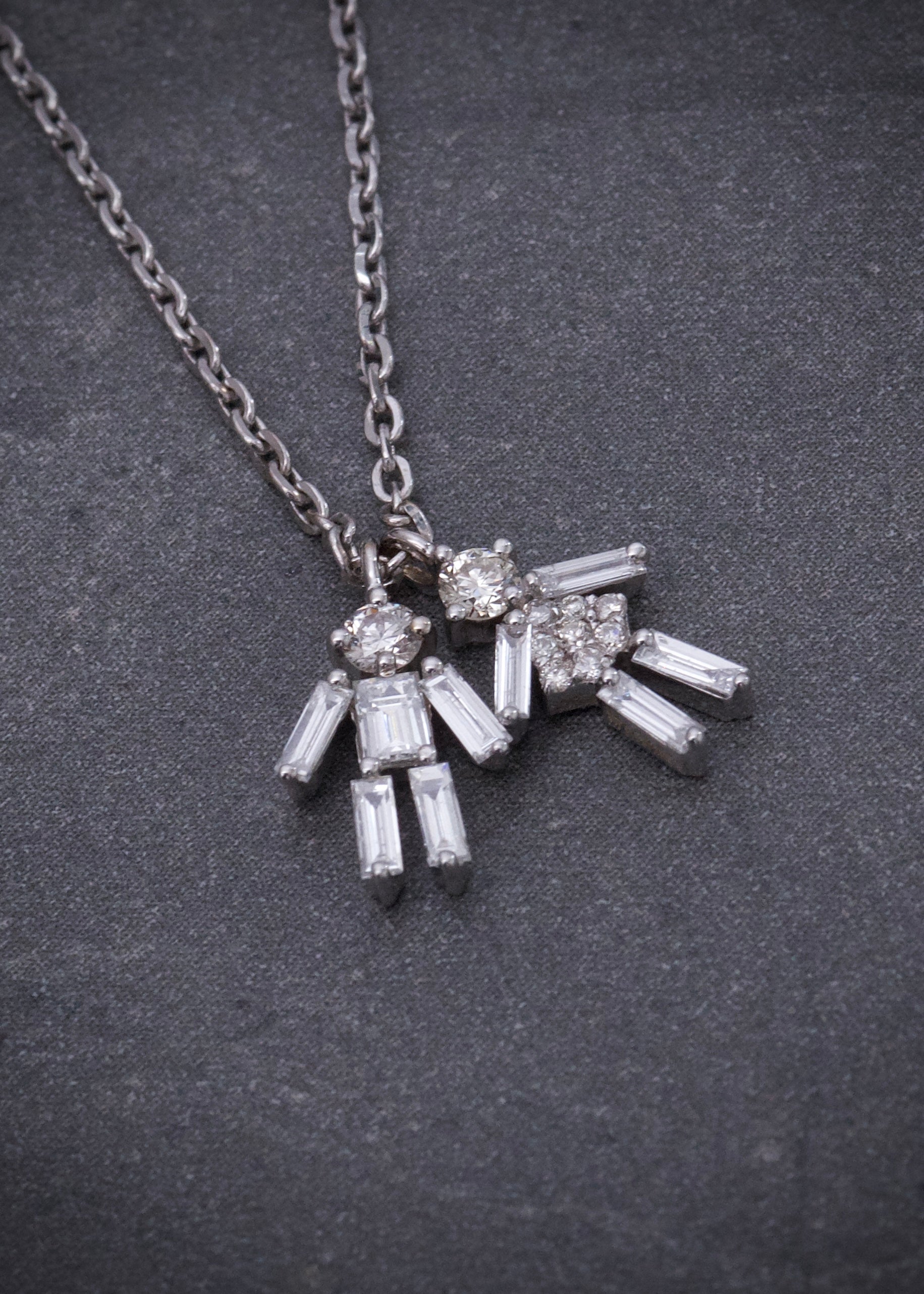 Cadena con 14pts de diamantes y 24pts de diamantes baguette 2.75gr / Largo 40cm / Oro Blanco italy cte (Joya) P