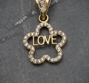 Dije De Flor Love Con Swarovski Blanco 1.55gr / Largo 2.3cm / Oro Amarillo Nac B