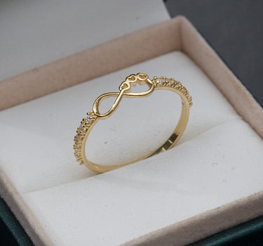 Anillo de infinito con corazones y swarovski blanco 1.45gr / Oro Amarillo Nac M