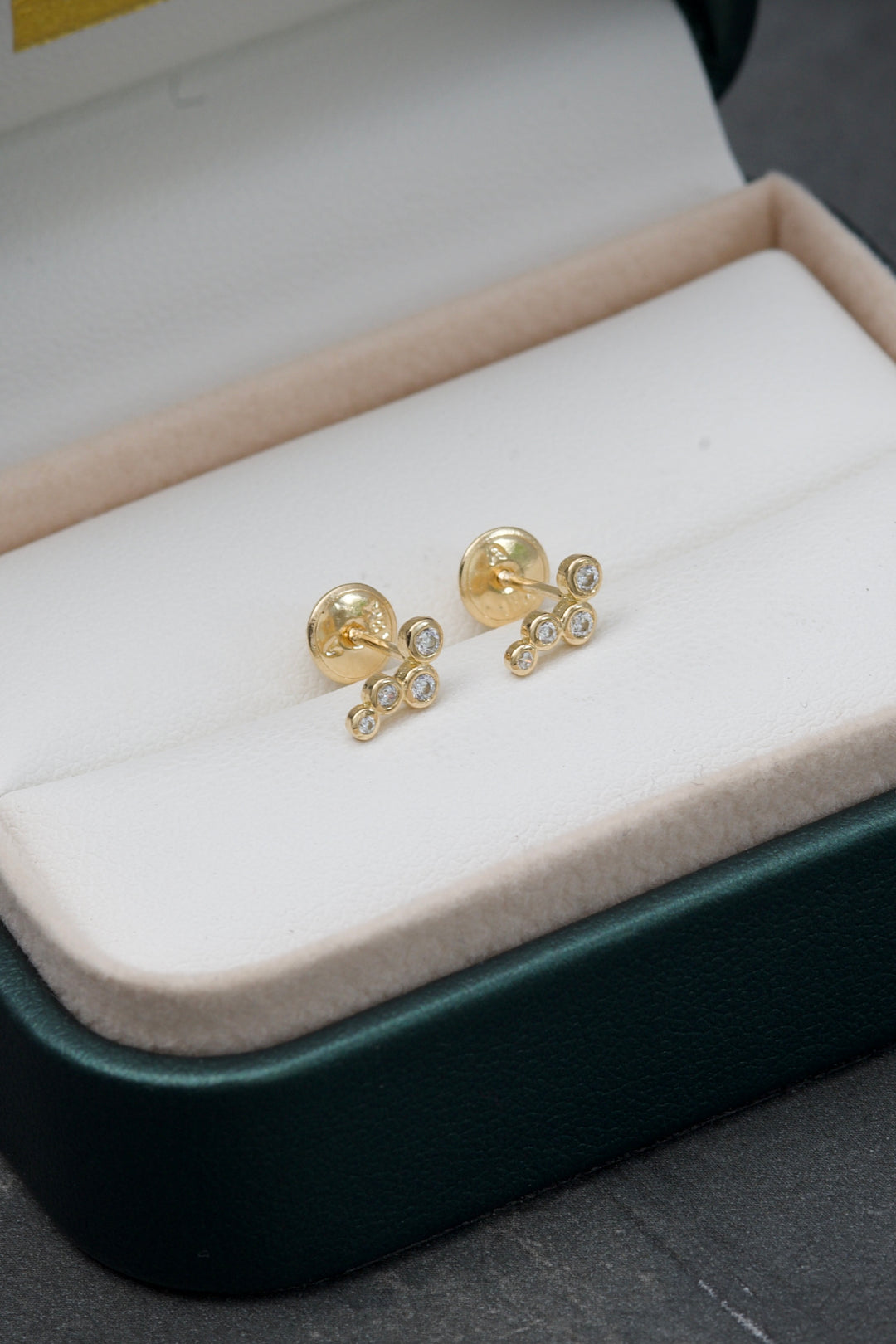 Topos de circulos con swarovski blancos 0.8gr — Oro Amarillo