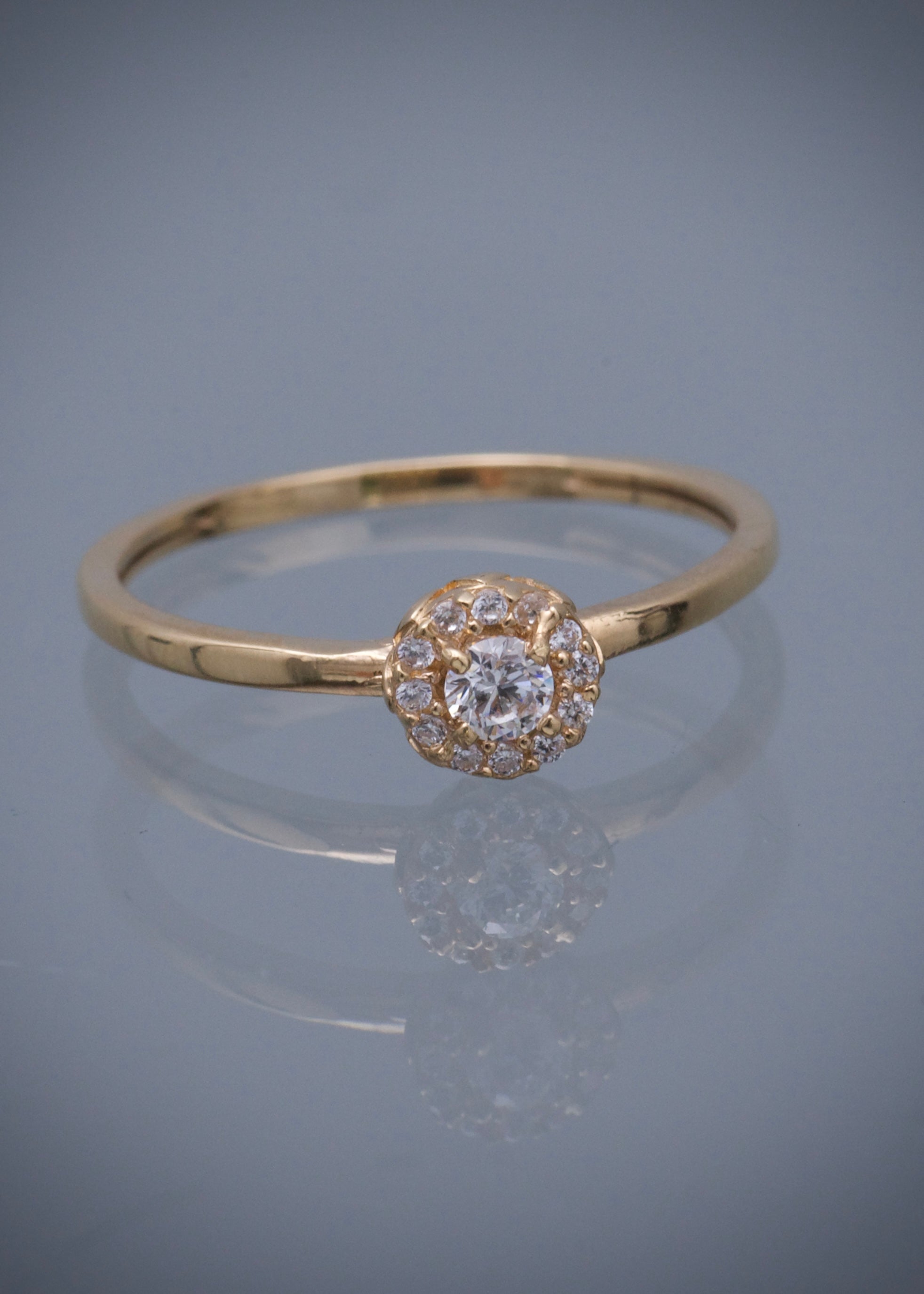 Solitario flor con swarovski blanco 1.7gr / Talla 7 1/4 / Oro Amarillo Nac B