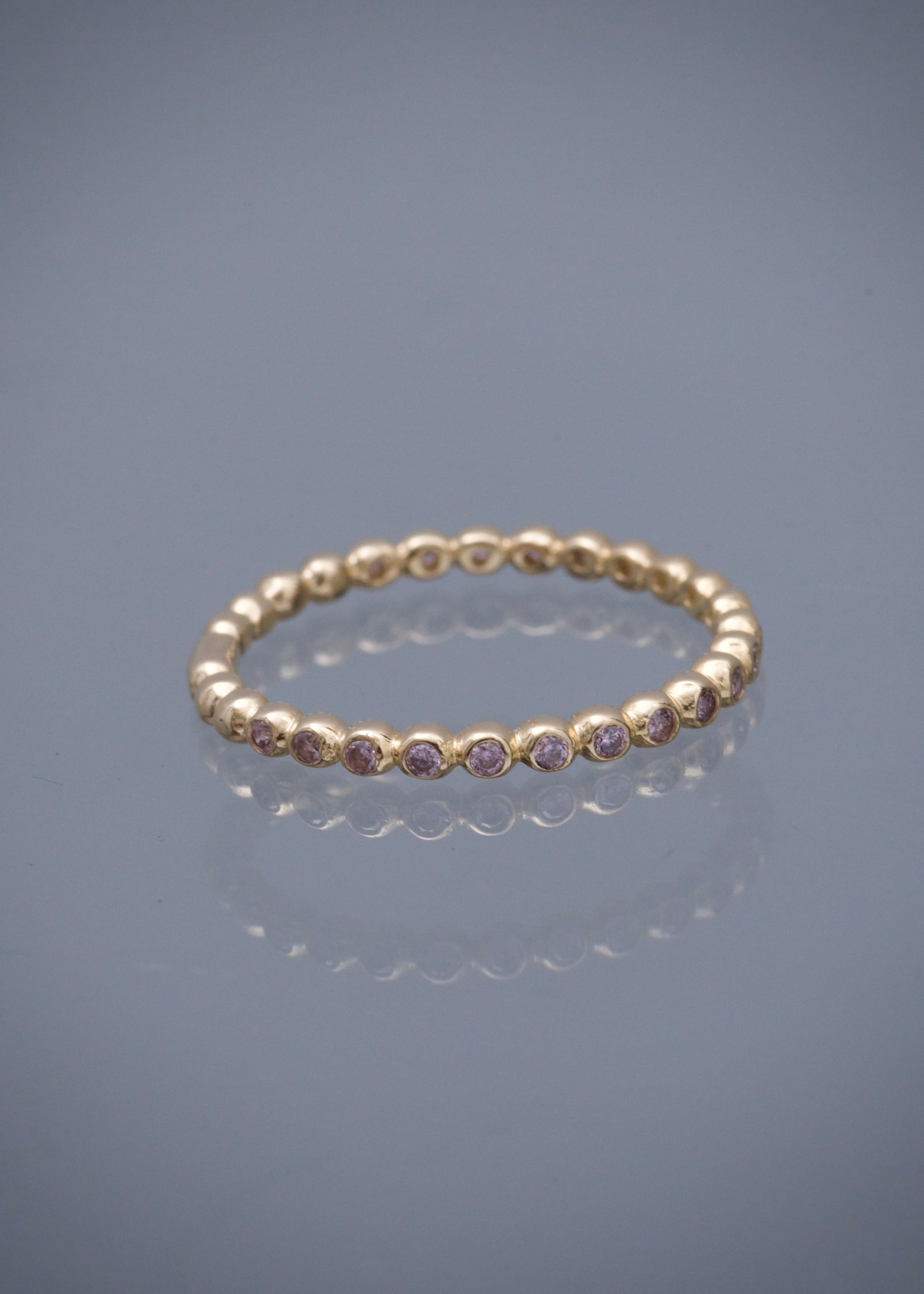 Anillo con swarovski rosado 1.4gr / TALLA 5 1/4 / Oro Amarillo Nac*